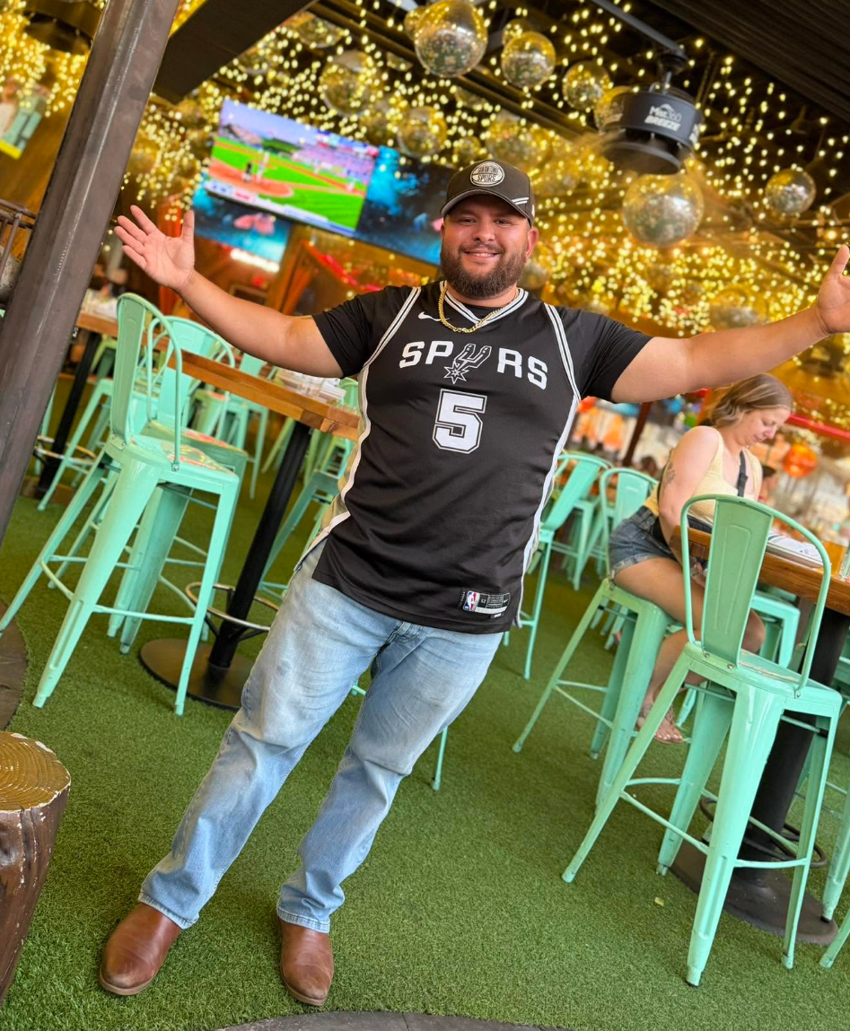 Mitchell Gonzalez in a Spurs jersey in San Antonio